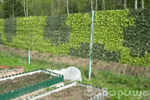 Ограждение из маскировочной сетки